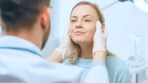 Woman having a consultation with her provider about whether biostimulators or filler would be better for her